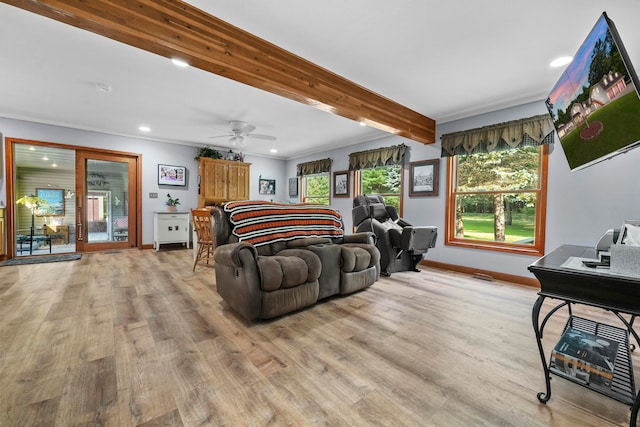 living room with beam ceiling, ceiling fan, and light hardwood / wood-style flooring