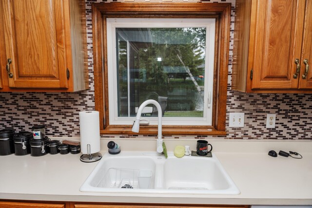 kitchen with sink and backsplash