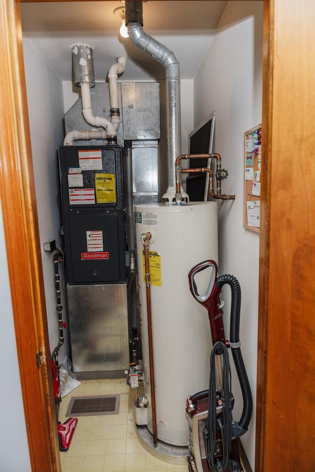 utility room with water heater