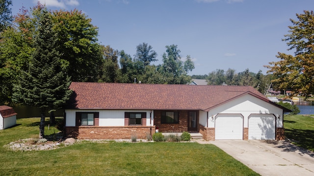 ranch-style house with a front yard and a garage