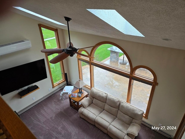 unfurnished living room with ceiling fan, a skylight, plenty of natural light, and carpet flooring