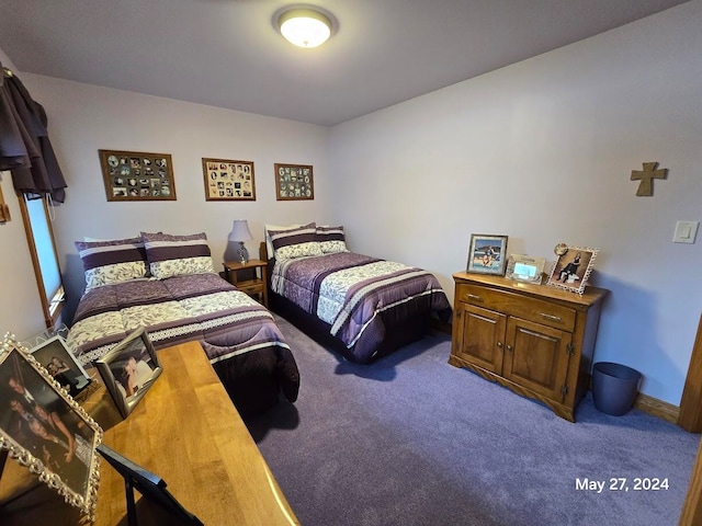 bedroom featuring carpet