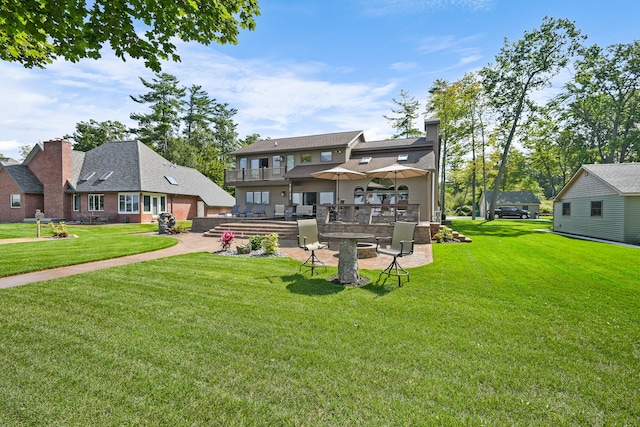 exterior space featuring a patio and a lawn