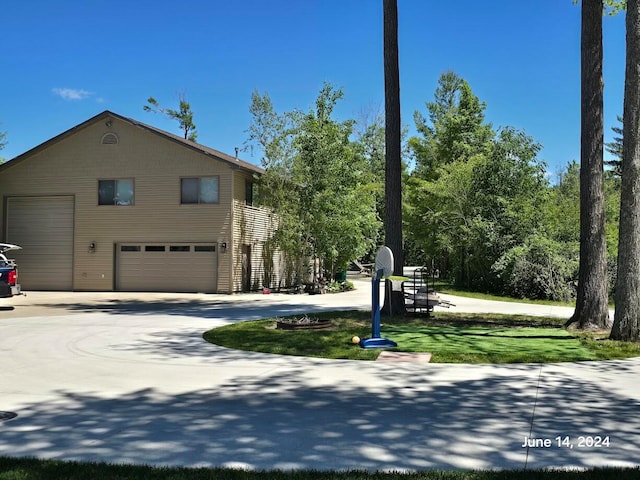 view of front of home with a garage