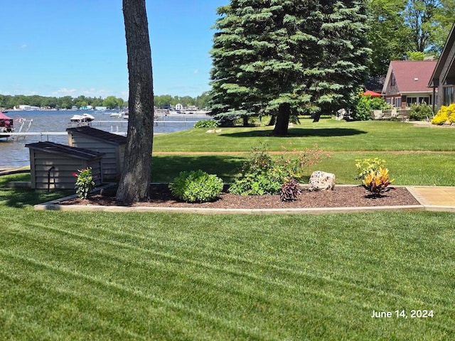 view of yard with a water view