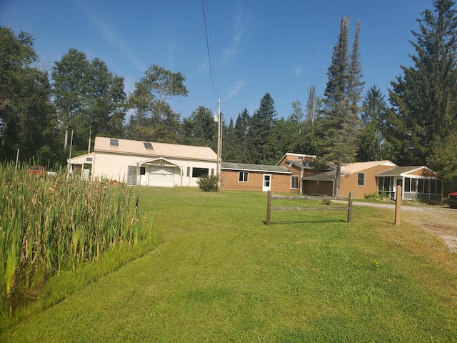 view of yard with a garage