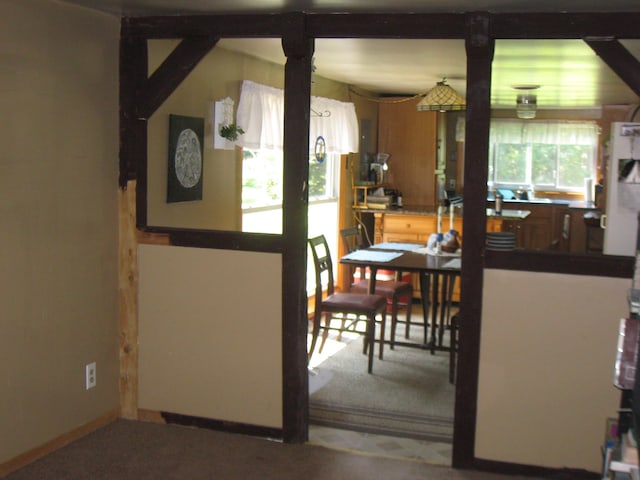 dining space featuring carpet floors