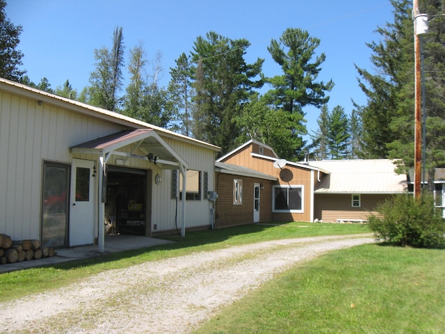 exterior space featuring a front lawn