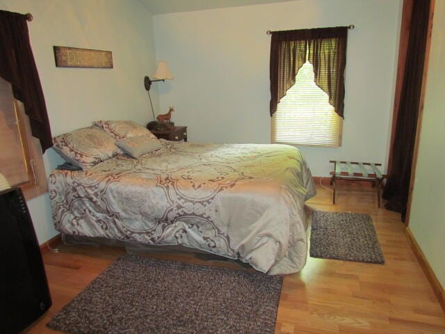 bedroom featuring light hardwood / wood-style flooring