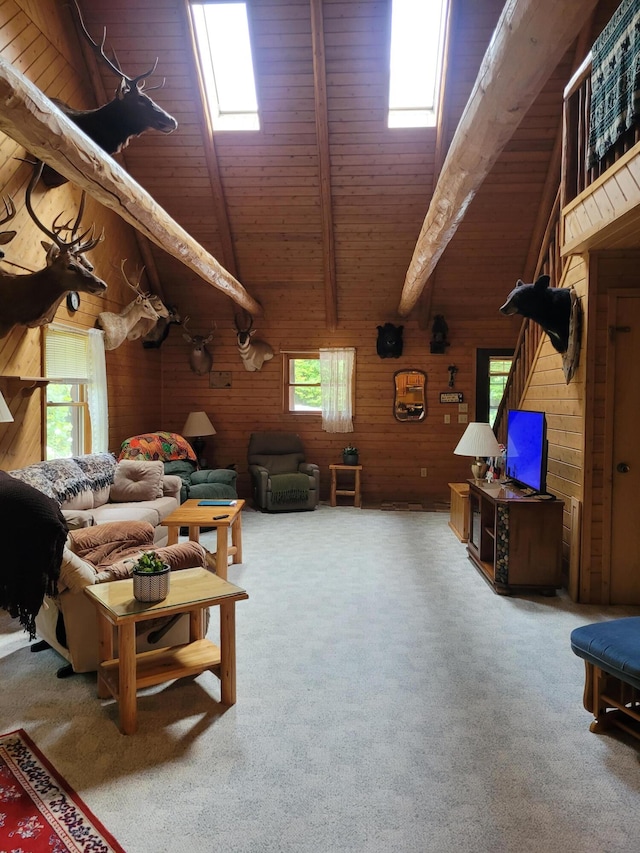 living room featuring wood ceiling, wooden walls, carpet, and beam ceiling