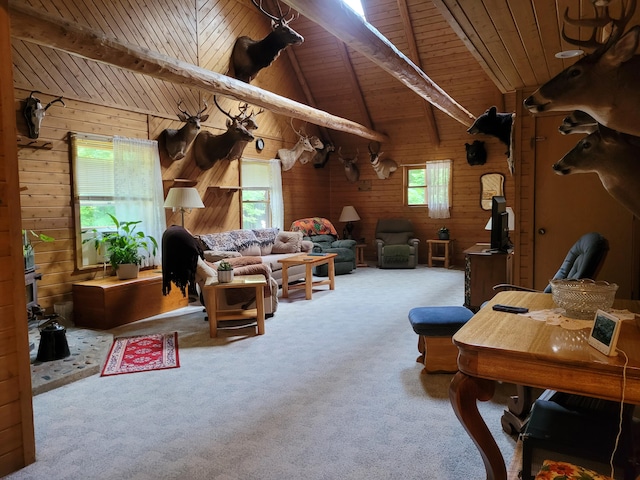 carpeted living room with wooden ceiling, lofted ceiling with beams, wooden walls, and a healthy amount of sunlight