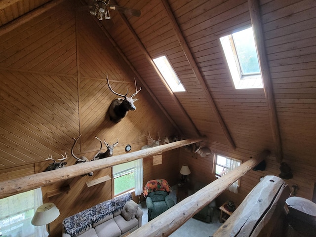 attic featuring a skylight