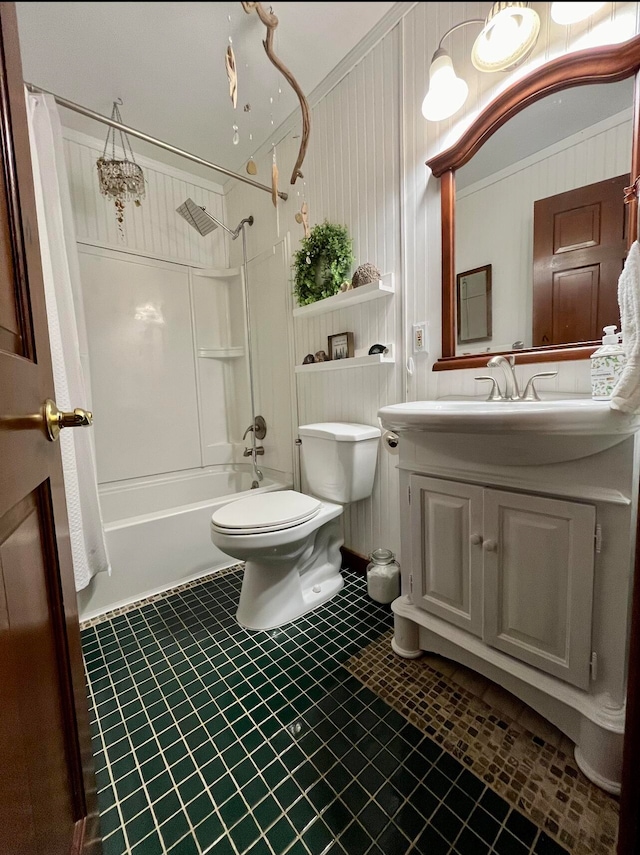 full bathroom with vanity, crown molding, tile patterned floors, toilet, and tub / shower combination