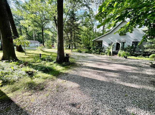 view of yard with covered porch