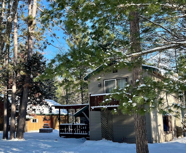 view of front of property with a deck