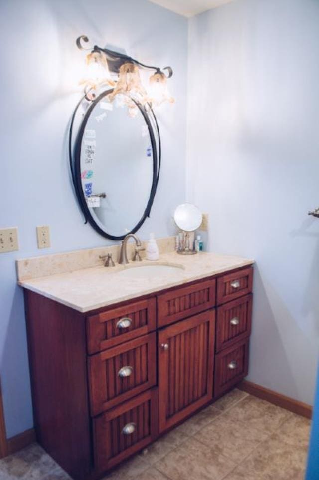 bathroom featuring vanity and tile patterned flooring