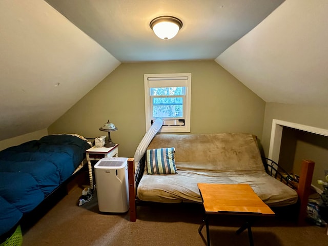 bedroom with vaulted ceiling and carpet flooring