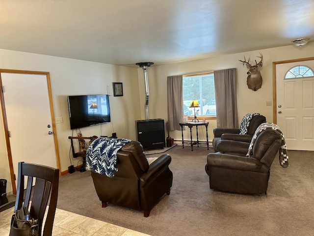 carpeted living area featuring baseboards