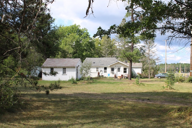 view of front of home with a front yard