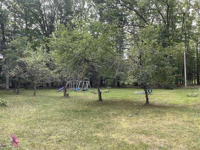 view of yard with a playground