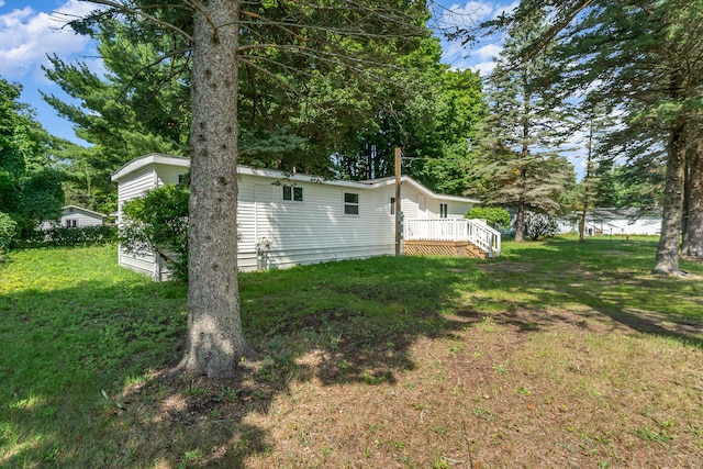 view of yard featuring a deck