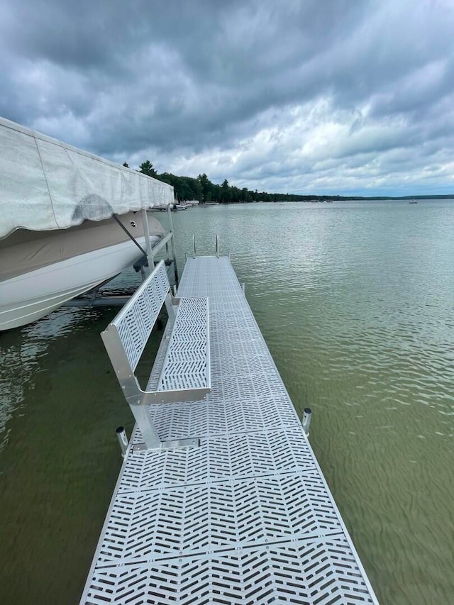 view of dock with a water view