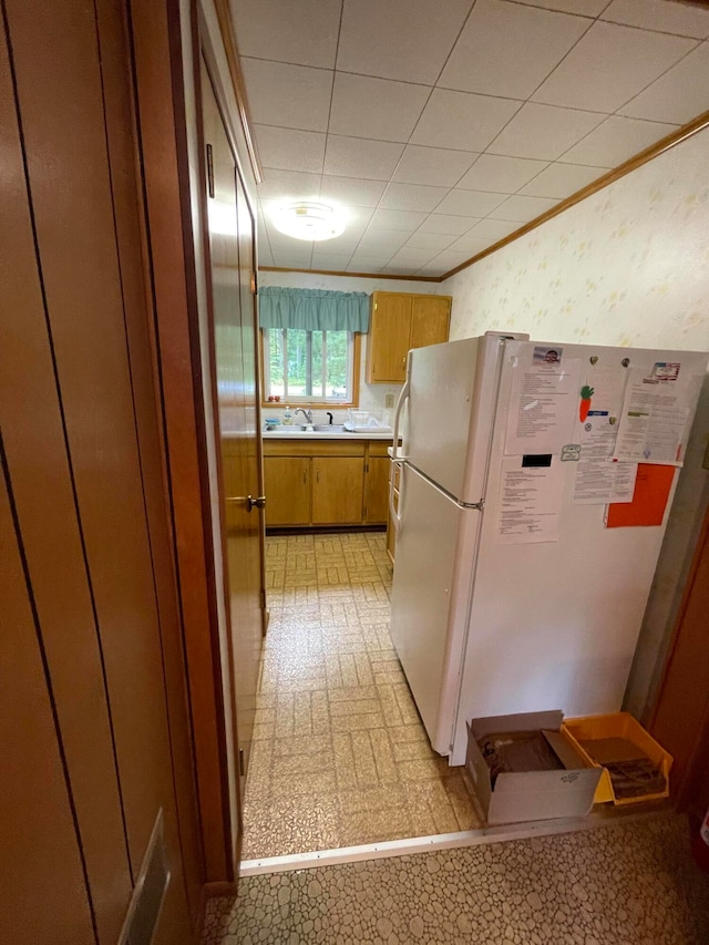 kitchen with white fridge and sink