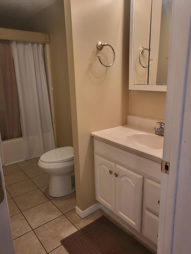 full bathroom with toilet, shower / tub combo, vanity, and tile patterned floors