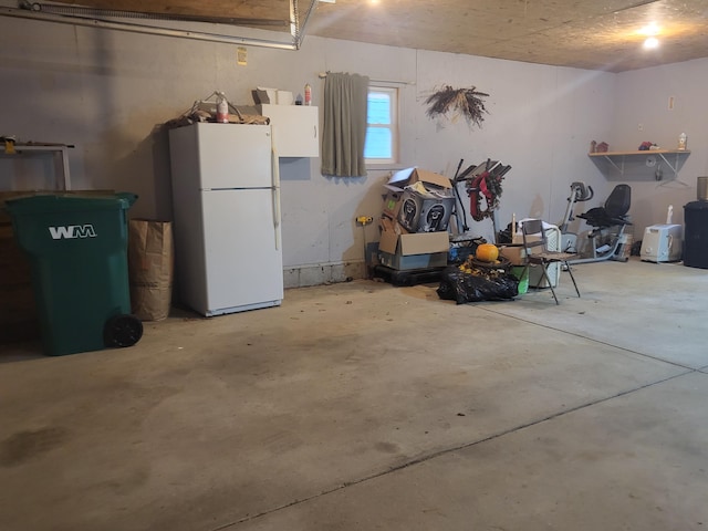 garage with white refrigerator