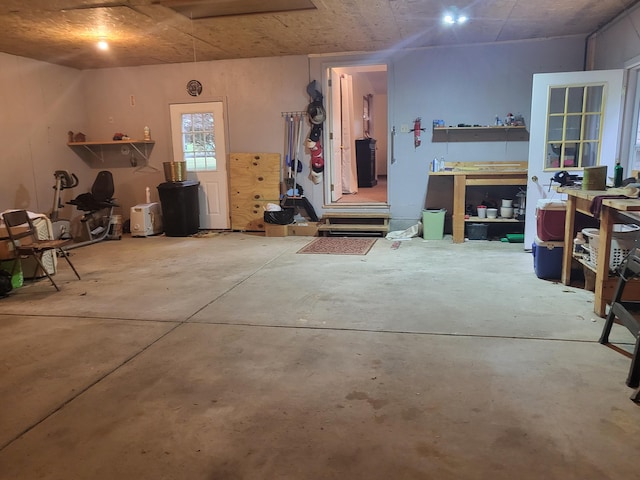 garage with a workshop area