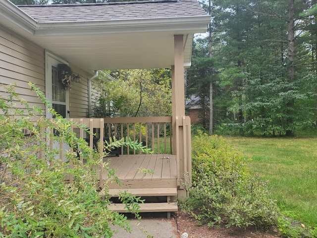 deck featuring a lawn