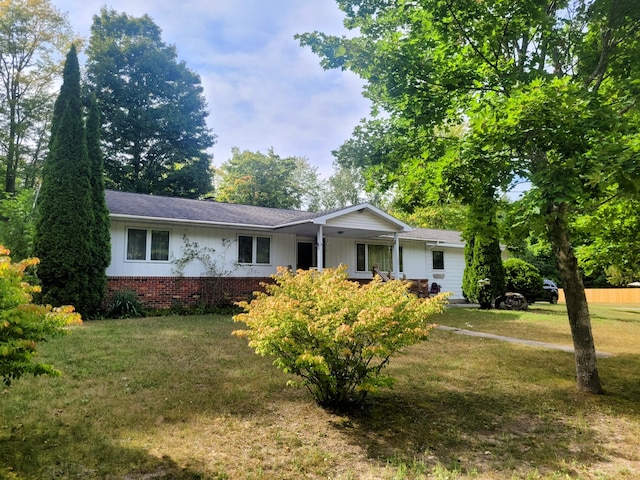 ranch-style house with a front yard