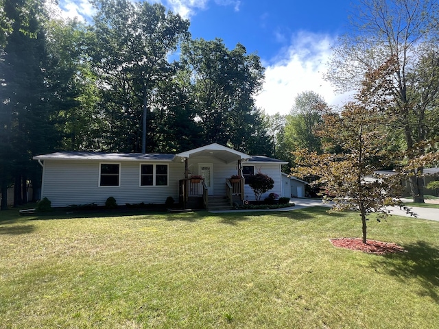 ranch-style house with a garage and a front yard