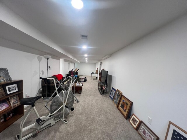 exercise room with carpet floors