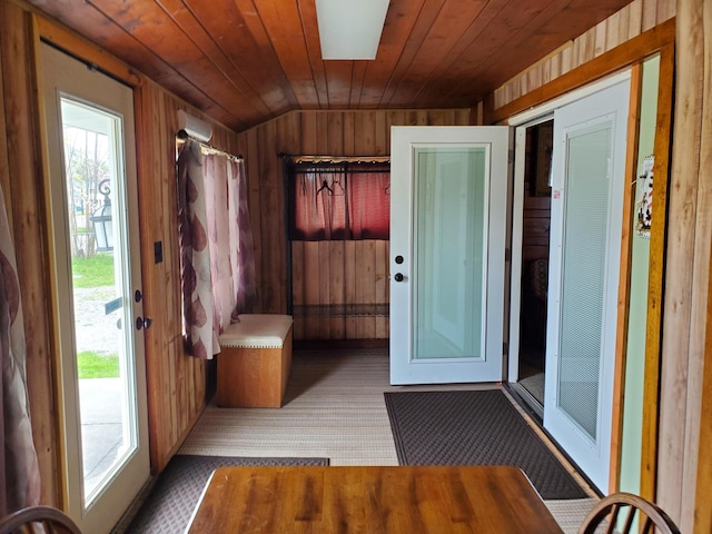 interior space with wood ceiling and lofted ceiling