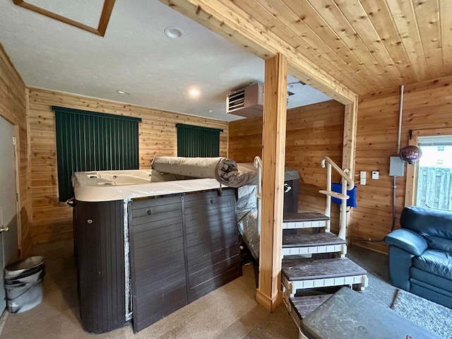 kitchen with wood walls and carpet floors