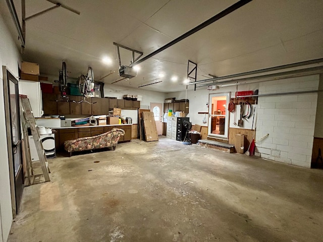 garage featuring a garage door opener