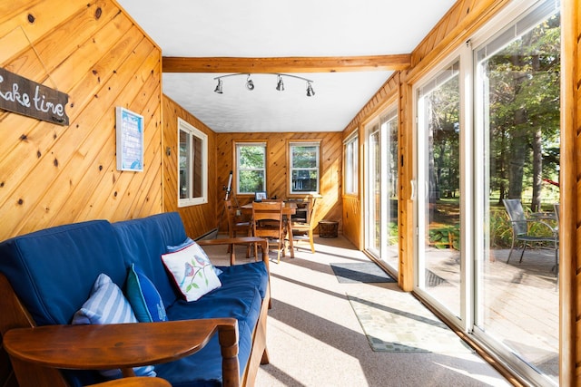 sunroom / solarium featuring plenty of natural light