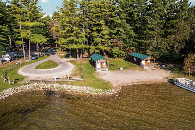 birds eye view of property featuring a water view