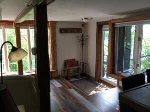 doorway featuring dark hardwood / wood-style floors and a wealth of natural light