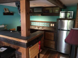 kitchen with hardwood / wood-style flooring and stainless steel appliances