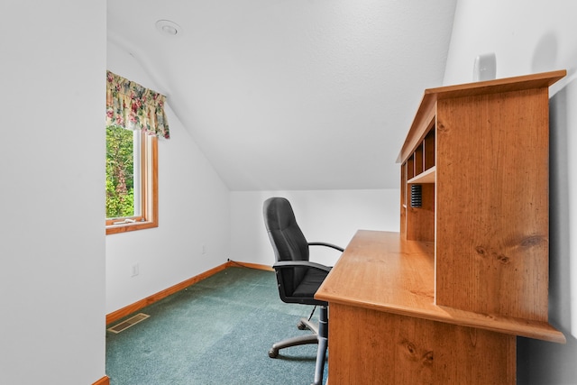 carpeted office space with lofted ceiling