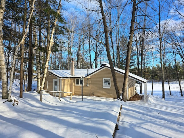 rear view of house with a deck