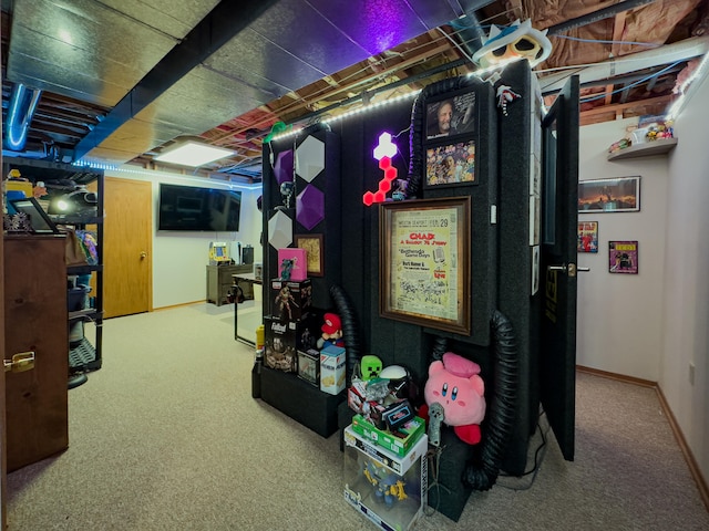 basement with carpet flooring