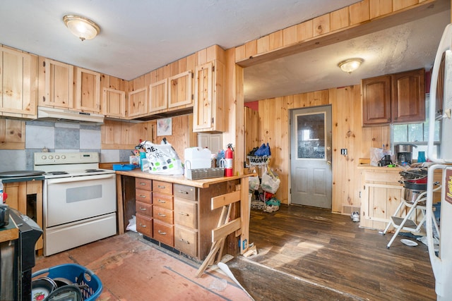 kitchen with light brown cabinetry, wood walls, white electric range oven, and dark hardwood / wood-style flooring