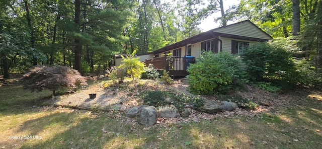 view of yard with a deck