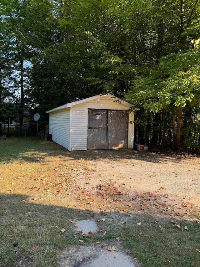 view of outbuilding with a garage