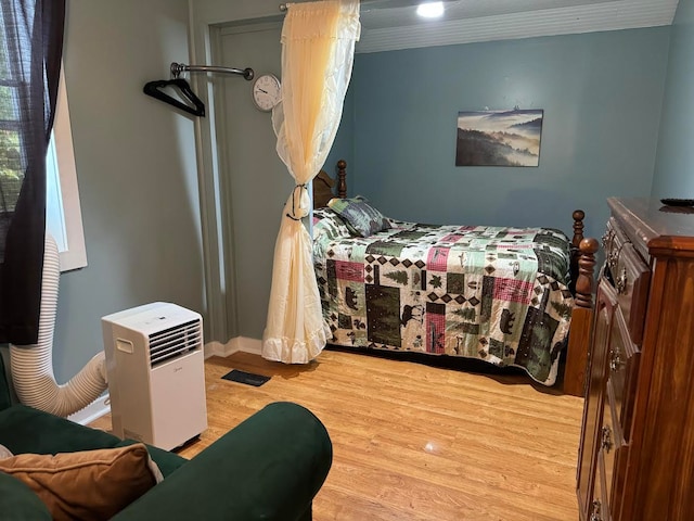 bedroom featuring light hardwood / wood-style floors