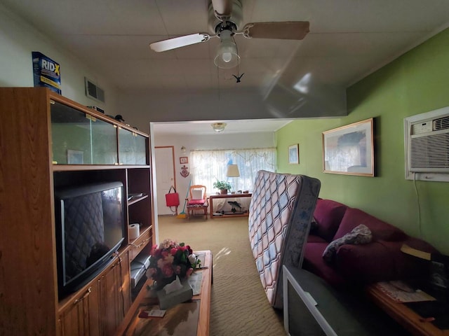 bedroom featuring carpet floors, a wall mounted air conditioner, and ceiling fan