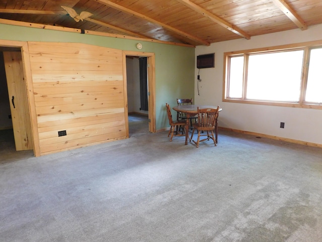 dining room featuring carpet flooring, lofted ceiling with beams, a wall mounted air conditioner, and wood ceiling